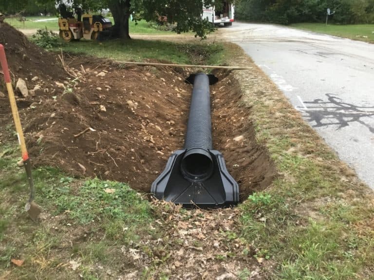 culvert next to road uncovered